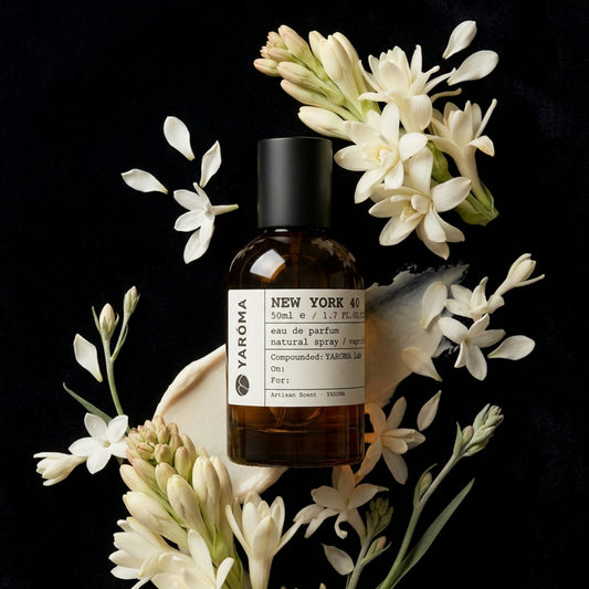 YARÓMA New York 40 Eau de Parfum editorial flat lay with tuberose