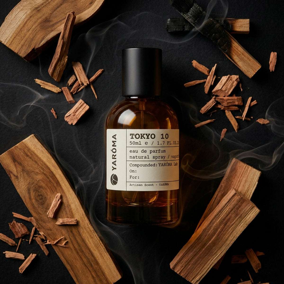 YARÓMA Tokyo 10 Eau de Parfum editorial flat lay with smoky guaiac wood